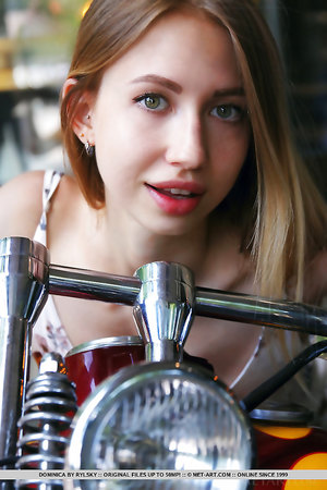 Beautiful blonde Dominica showing off her sexy slender body in solo