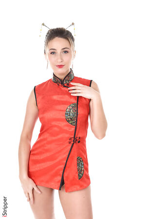 Blonde cutie Cara Mell unbuttons a red Chinese dress