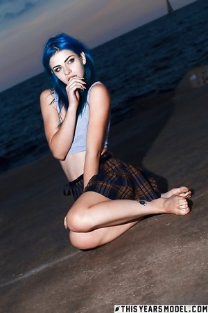 Gorgeous teen Ivy Blue shows off her tiny body by the river