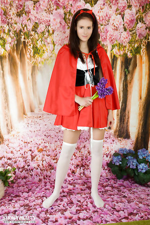 Sexiest teen Kora in Alice in wonderland costume teases with her naked snatch