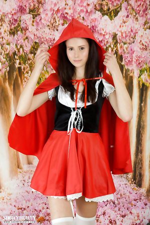 Sexiest teen Kora in Alice in wonderland costume teases with her naked snatch