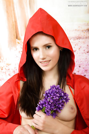 Sexiest teen Kora in Alice in wonderland costume teases with her naked snatch
