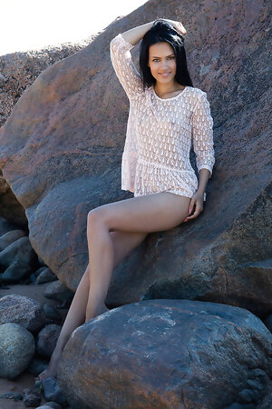 Beautiful model Lada A poses naked on the beach