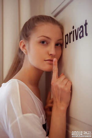 Gorgeous slender babe Bretona shows off her shaved snatch and cute tits