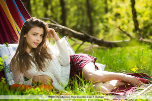 Brunette teen Mila Azul is stripping off while hiking in the woods