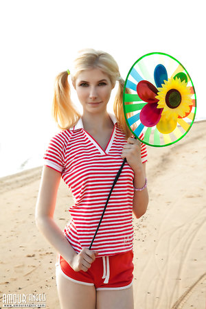 Teen Candy Bloom with Pigtails showing her nice slightly furry beaver