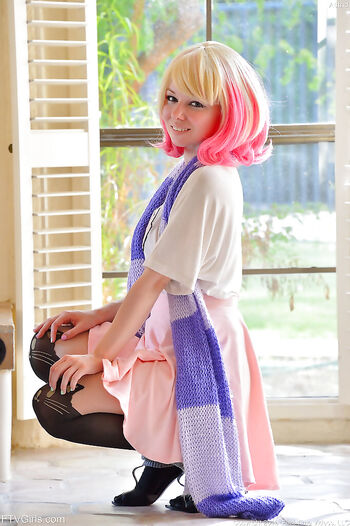 Lovely teen Astrid with a nice ass strips from cosplay clothing