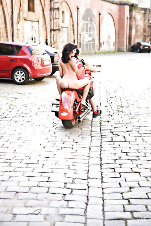 brunette babe Tess Posing Beside Her Bike Naked