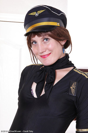 Skinny stewardess in black stockings Katrina Mathews caressing her mature snatch