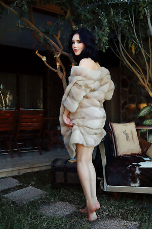 Dark haired goddess Malena Fendi with pale skin embracing her pink pussy lips