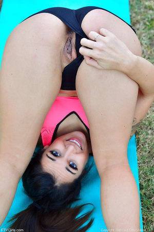 Tattooed brunette goddess Jynx Correra spreads her legs and teases with twat