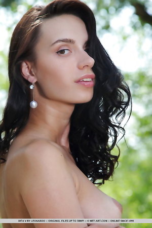 Beautiful brunette model Dita V shows her hot ass and pussy close up