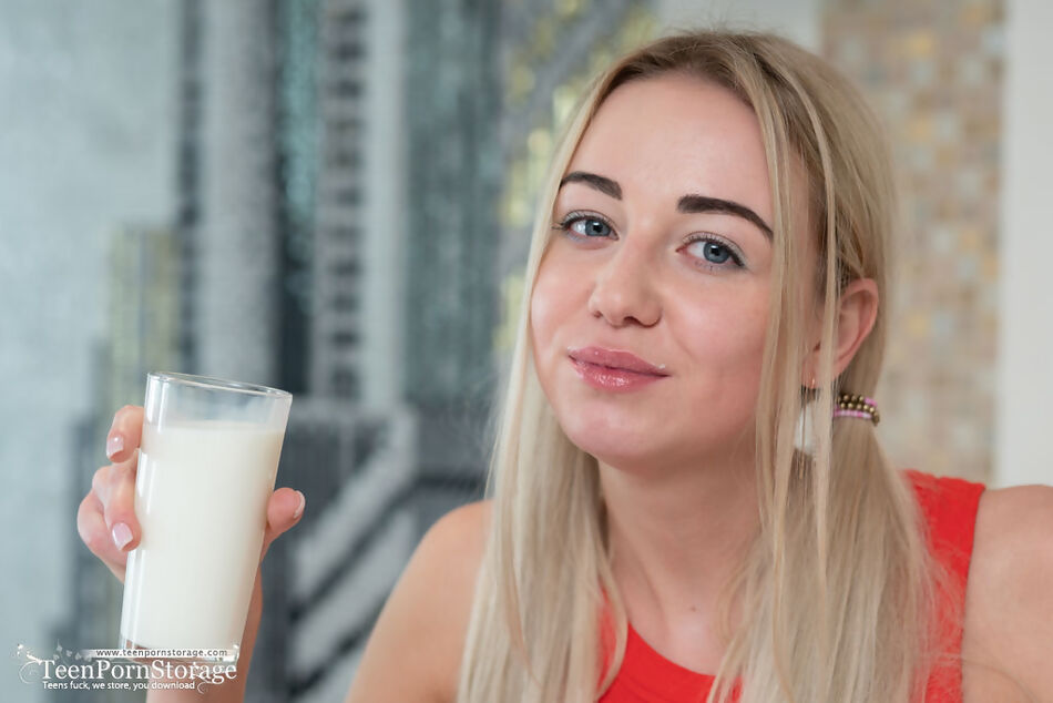 Cute Blonde With Pigtails Iva Drinking Milk And Flashing Big Tits  