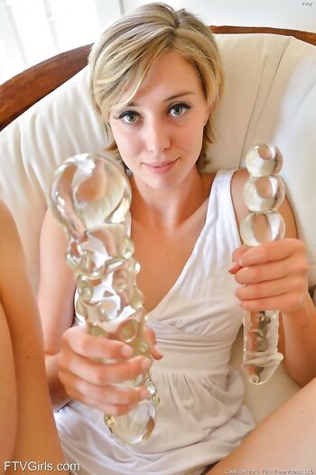 Freaky blonde Amy stuffs her ass with glass dildos after vibrator seance