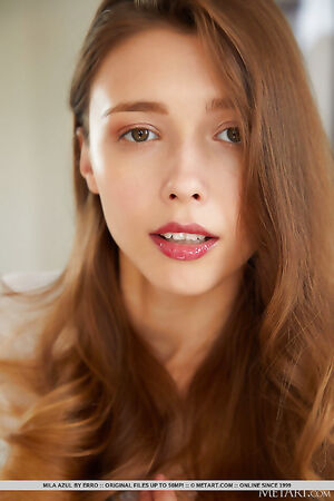 Cute teen Mila Azul flaunts her natural huge melons and shaved beaver