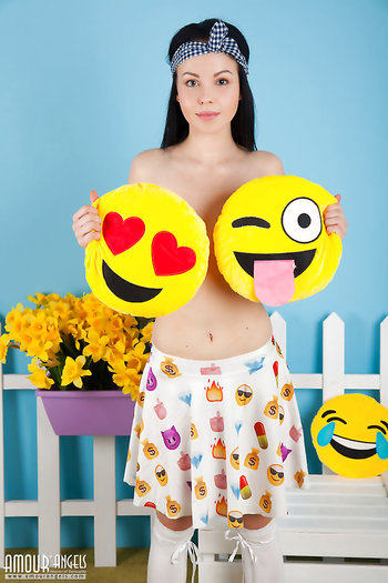 Busty teen babe Vasilisa shows off her natural assets wearing white socks