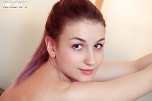 Horny petite teen Sacha with a perfect ass strips and spreads her legs