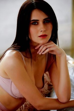 Gorgeous teen Leila Special takes off cute pink lingerie