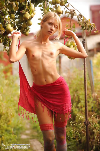 Peasant sweetie with flat titties Jenny strips completely naked in the orchard