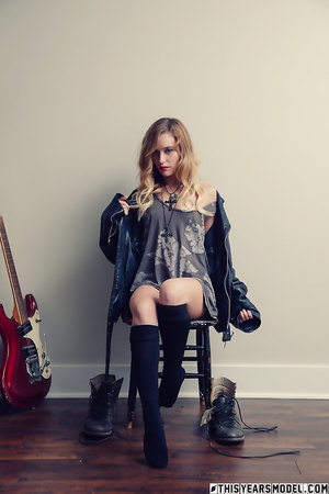 Indie rock chick Samantha Styles strips down to her stockings and guitar only