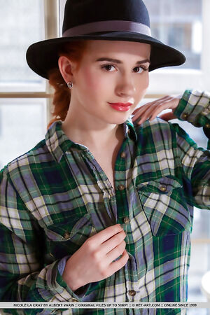 Fiery bookworm Nicole La Cray seducing with wonderful breasts underneath a plaid shirt