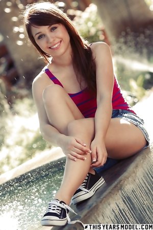 Hot ginger teen Marissa Mei takes off her clothes in the public fountain