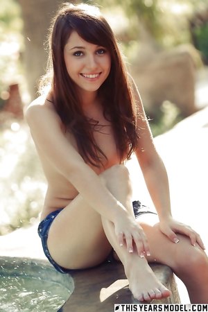 Hot ginger teen Marissa Mei takes off her clothes in the public fountain